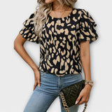 Lela - Blusa estilosa com mangas de pantera