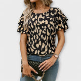Lela - Blusa estilosa com mangas de pantera