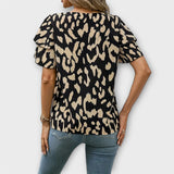 Lela - Blusa estilosa com mangas de pantera